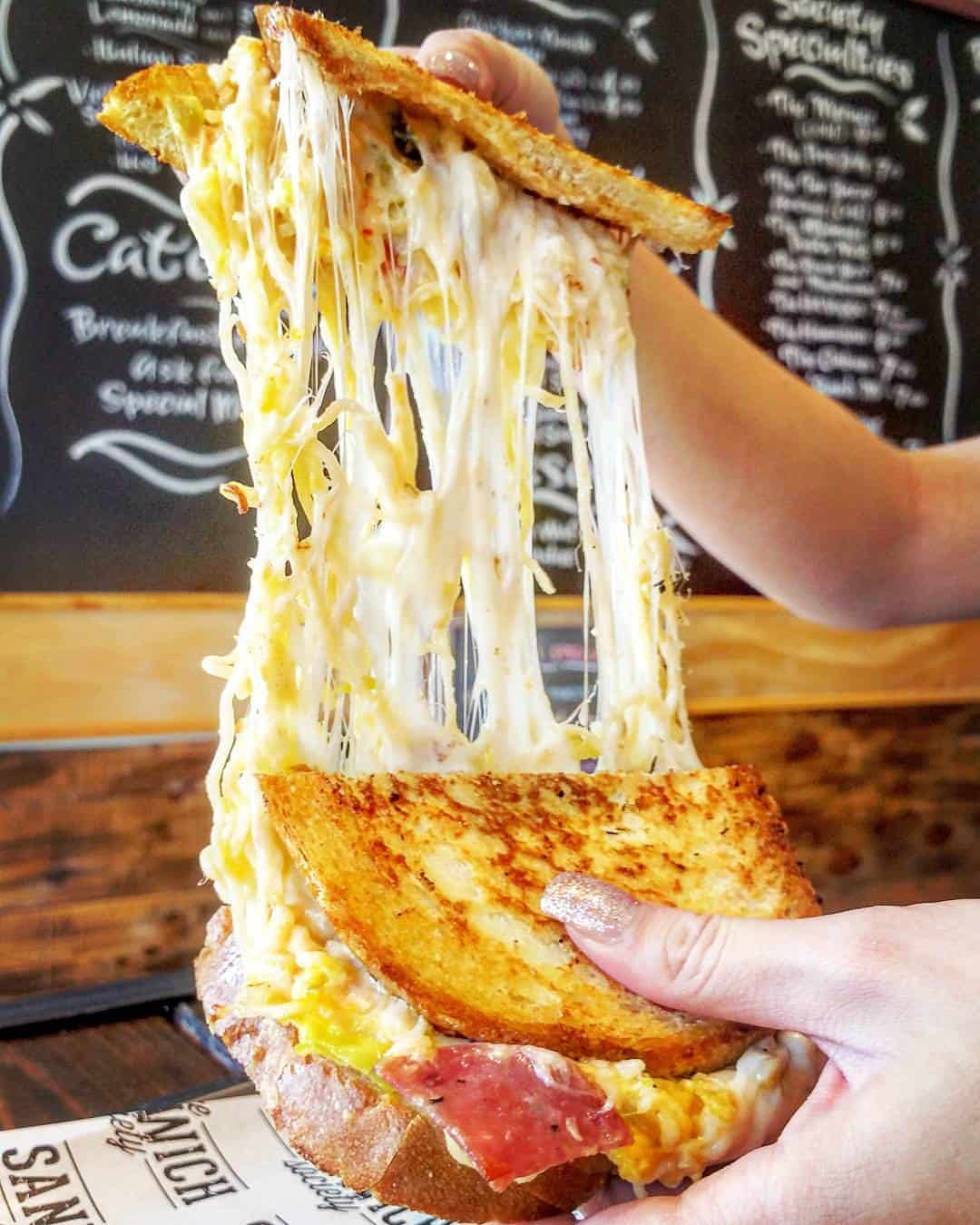 man barricades grilled cheese