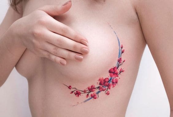 beautiful flower tattoo around breast, beautiful flowers tattoo side boob, beautiful red flowers side boob tattoo, wholesome side boob tattoo, wholesome boob tattoo, side breast tattoo, boob tattoo, side boob tattoo